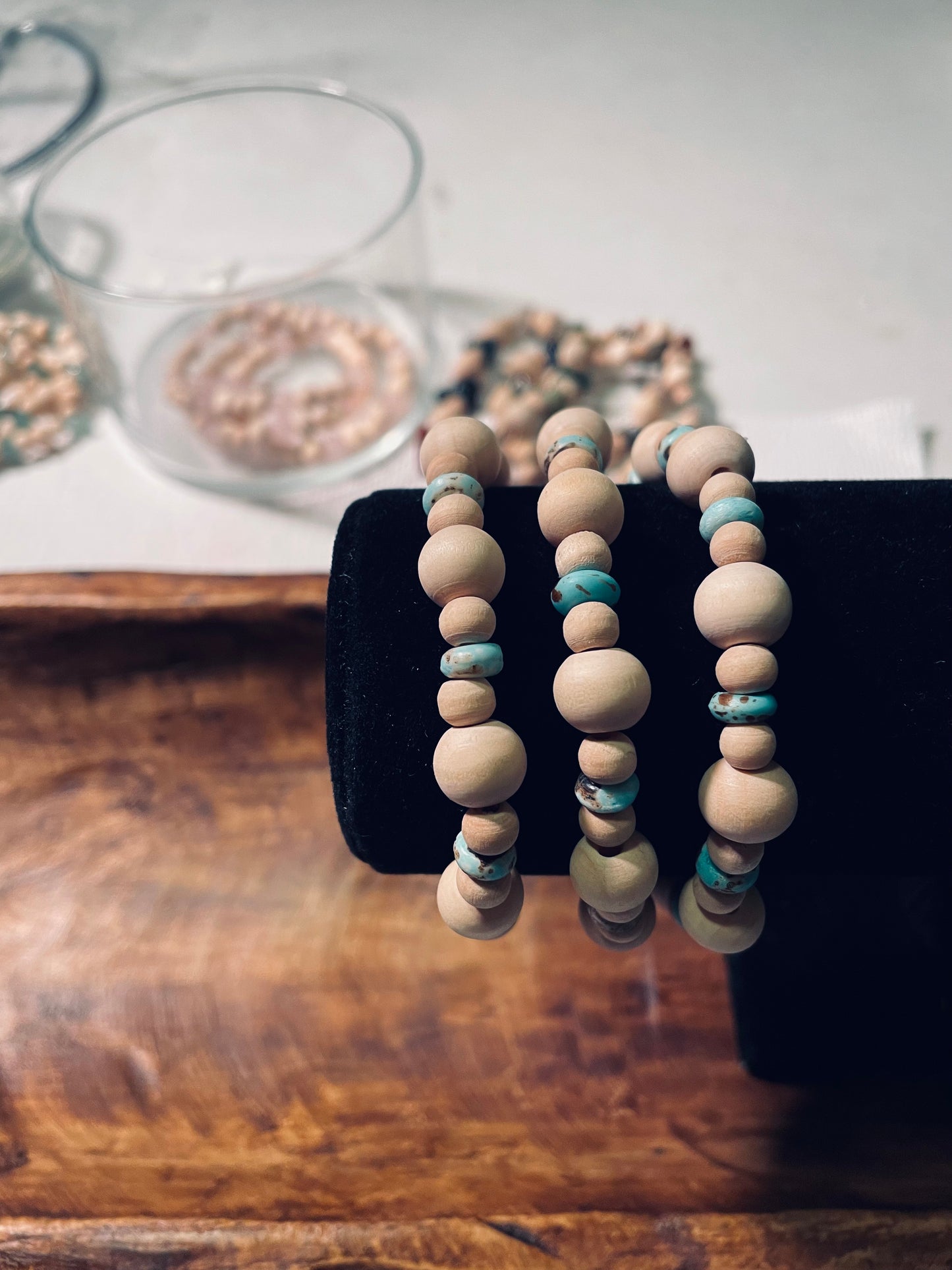 Distressed plastic and wood bead bracelets